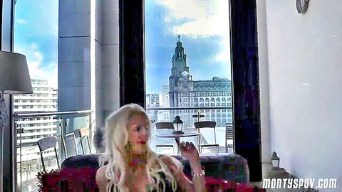 Tia Layne blonde in stockings poses seductively on couch