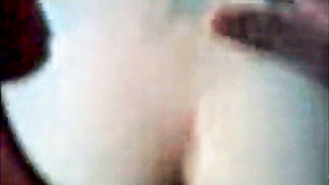 Blurry close-up of woman's exposed vulva and legs in white outfit, birthday theme