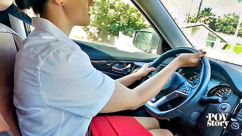 Penny Barber POV driving in car, white shirt red skirt