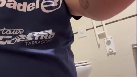 Blondie in Tour del Puesto Tarragona shirt, arm tattoo, bathroom selfie