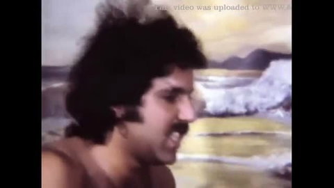 SAMart hairy chest hunk yells shirtless by beach waves in Candy Girls 153