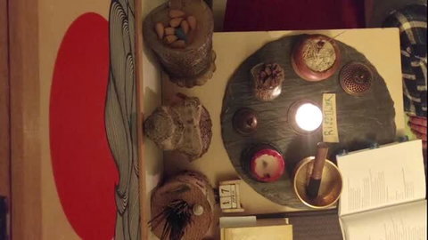 Zen model in serene Buddhist altar setup for daily chant practice