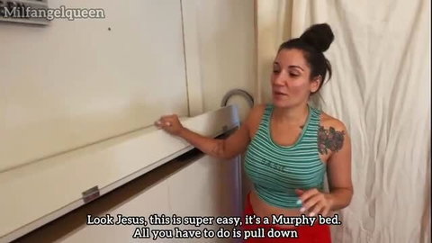 Tattooed brunette MILF in tank top shows off Murphy bed in tight room