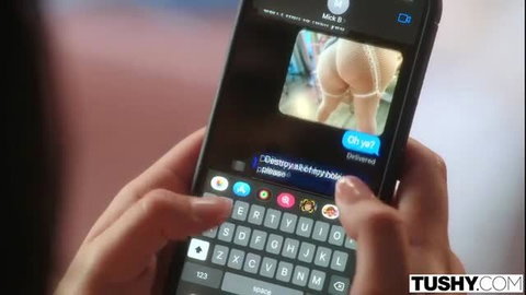 Whitney Westgate's big ass in thong, sexting on phone in Tushy scene
