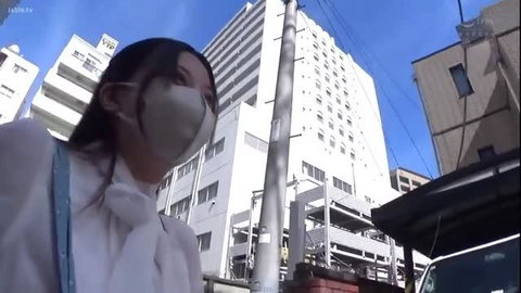 Masked JAV girl Mirei Kazatani walks in blouse on sunny street