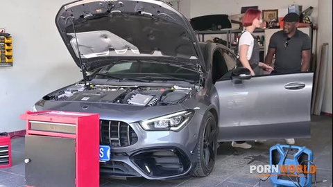 Redhead Dolly Dyson in overalls by Mercedes in garage - Porn World