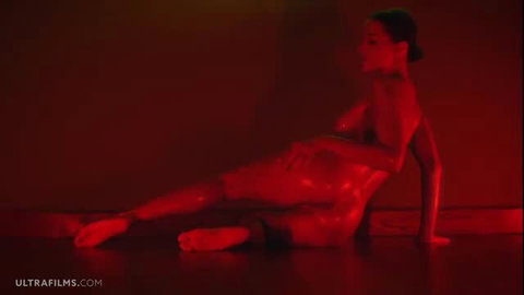 Gorgeous Asian girl flaunts oiled naked body, softly teasing herself