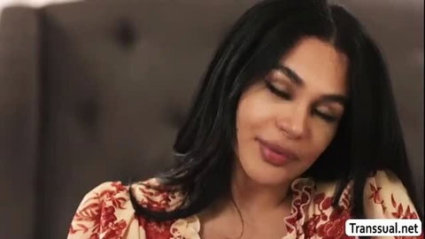 Busty black tgirl Eva Maxim closeup in floral dress