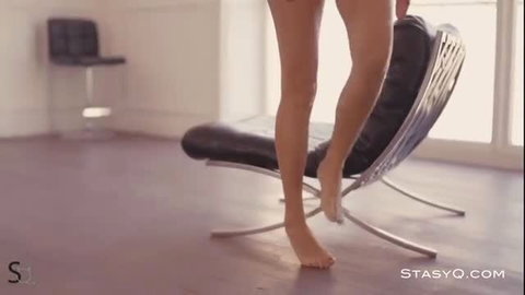 Sexy skinny babe naked legs spread teasing on chair