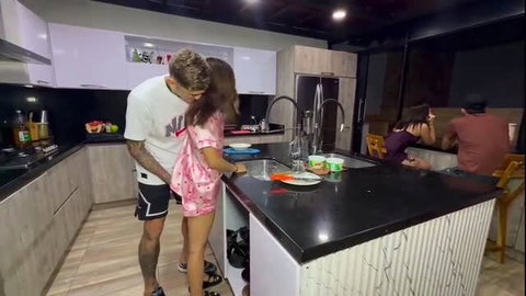 Hot couple kissing intimately in kitchen, babe in pink lingerie