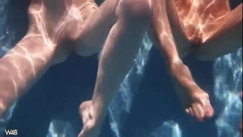 Nude babes Lila and Emily legs kissing underwater