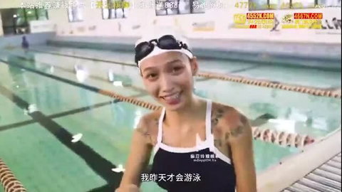 Asian swimmer girl in swimsuit sticking tongue out poolside tattoos