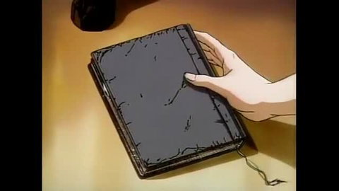 La Blue Girl vol 1 anime hentai hand holding ancient black book