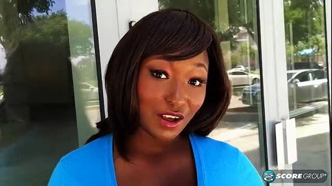 Marie Leone black ginger MILF in blue top, smiling outdoors in Miami