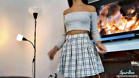 Squir7een in off-shoulder top and plaid skirt, teasing seductively
