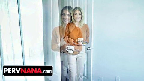 Blonde mature Gigi Dior seductively holds cups in orange top and white pants