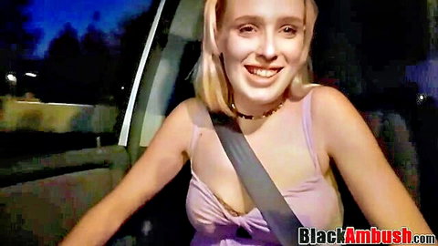 Blonde amateur Natalie smiling in car for Black Ambush tease