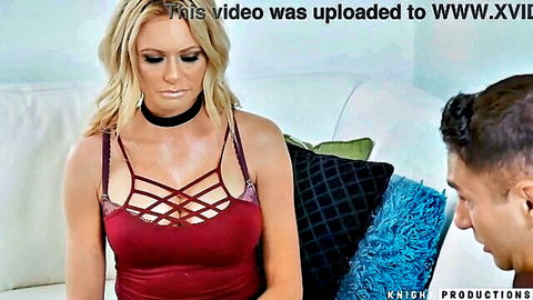 Briana Banks in revealing red top and choker, seductive pose with man