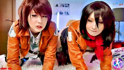 Mikasa and Historia cosplay babes in Survey Corps uniforms posing seductively