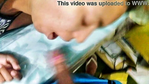 Blurry close-up of amateur blowjob with woman sucking cock during cuckold scenario