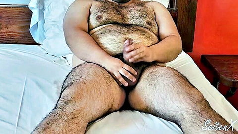 Hairy chubby bear man masturbating solo on bed, huge cumshot preview