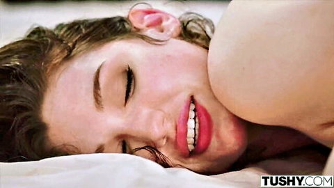 Blissful brunette Lily smiling nude in bed, TUSHY anal interview