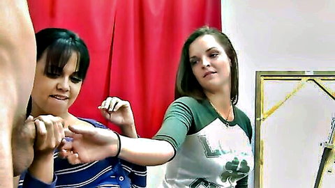Abby Darling and friend in CFNM art class examining naked man's cock