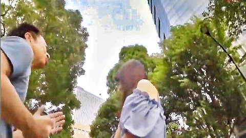 Asian couple outdoors, woman in off-shoulder top, JAV style