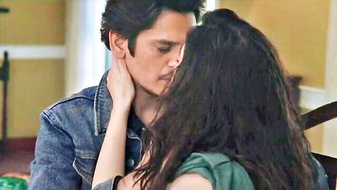 Hot Indian couple passionately kissing with neck grab in romantic foreplay