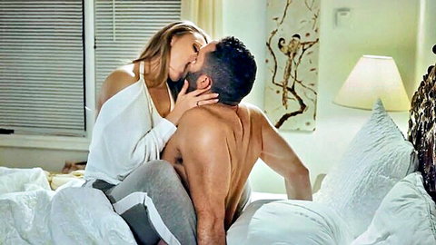Aj Applegate passionately kissing muscular man in shared bed