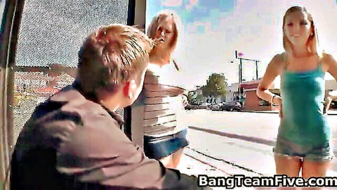 Blonde in mini skirt smoking and brunette in hotpants teasing guy inside van BangTeamFive