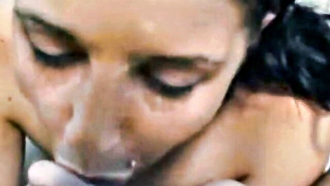 Amateur woman with thick messy cumshot dripping from her lips and chin after blowjob