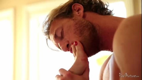Brandi Love's red toenails in Ryan McLane's mouth foot fetish tease