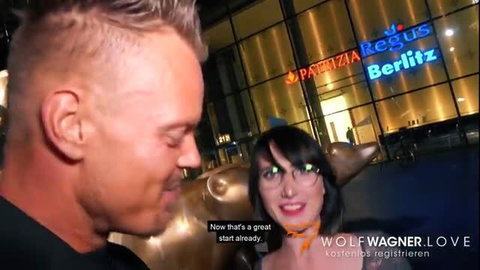 Lou Nesbit smiles at Bodo outside Berlin club, teasing start