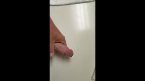 Hand stroking hard pink cock closeup in steamy amateur wank session