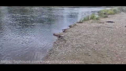 Sissy femboy fucked outdoors by the riverbank on gravel path