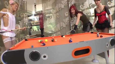 Rocco Siffredi with three women around pool table in lingerie