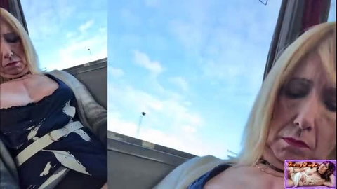 Blonde trans woman in blue dress exposing herself on public transit