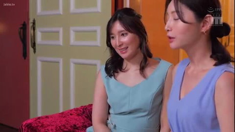 Two beautiful Japanese women in elegant dresses, softcore lesbian JAV scene