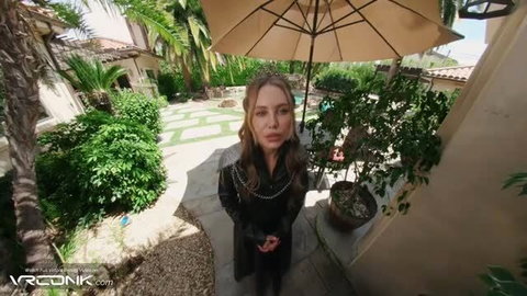 Blonde Game of Thrones porn parody actress in black dress outdoors
