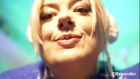 Blonde model with big lips and nose ring close-up smile