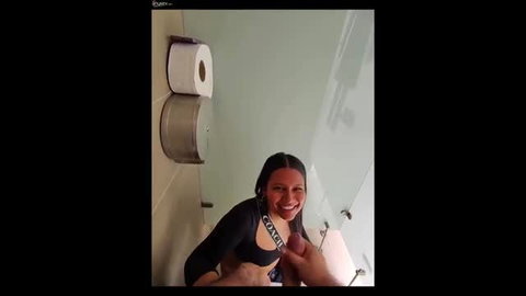 Daisy Stone giving blowjob in public bathroom