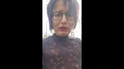 Mature redhead in sheer lace top prepared for outdoor squirt scene