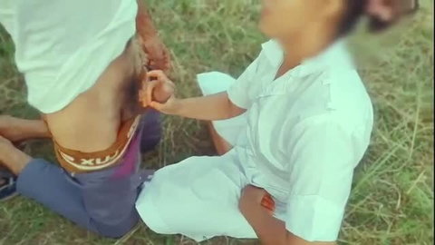 Indian nurse giving outdoor handjob to shirtless male patient