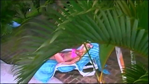 Lesbian outdoor sex with bikini girlfriend on lounge chair