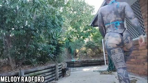 Melody Radford outdoor walk in sheer bodysuit and blue micro bikini