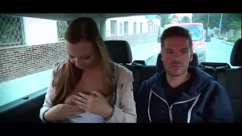 Angie Emerald flashing big tits in car while male driver watches