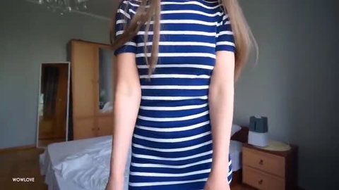 Hot German MILF wowlove in tight striped dress, standing in bedroom