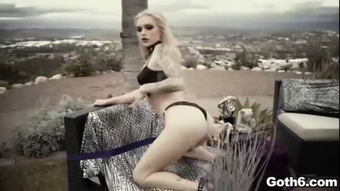 Alex Grey in black micro bikini, posing outdoors in goth style