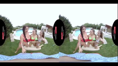 Three women in bikinis posing on a lounge chair by the pool in VR 180